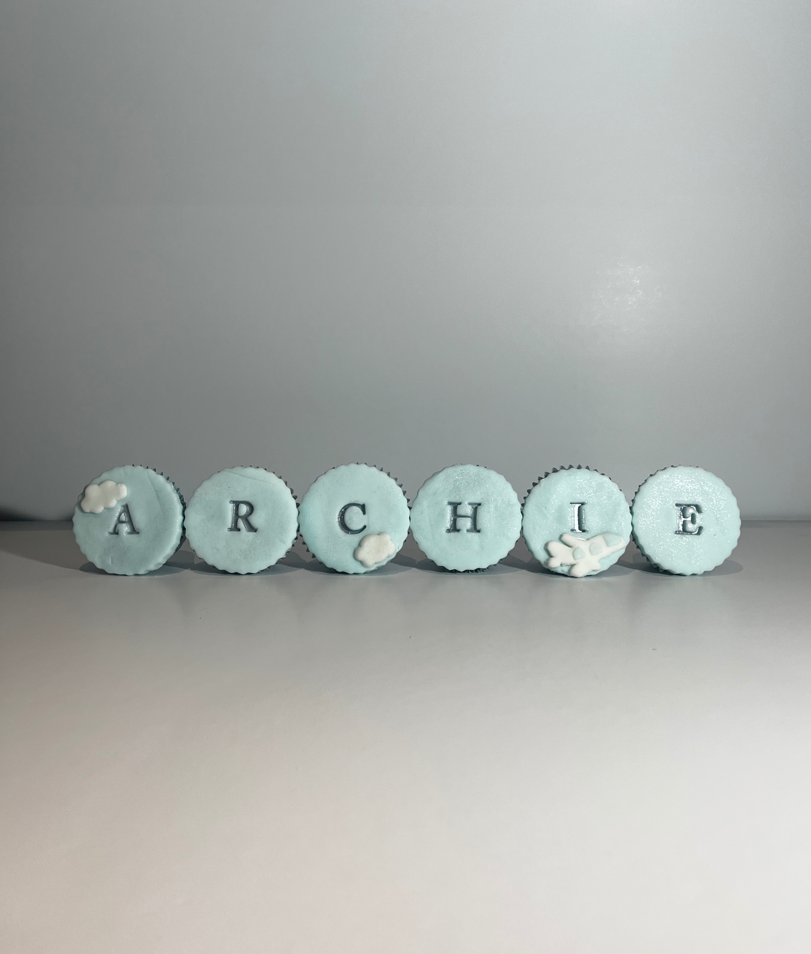 Hand-stamped pastel cupcakes by Cakes by ERS